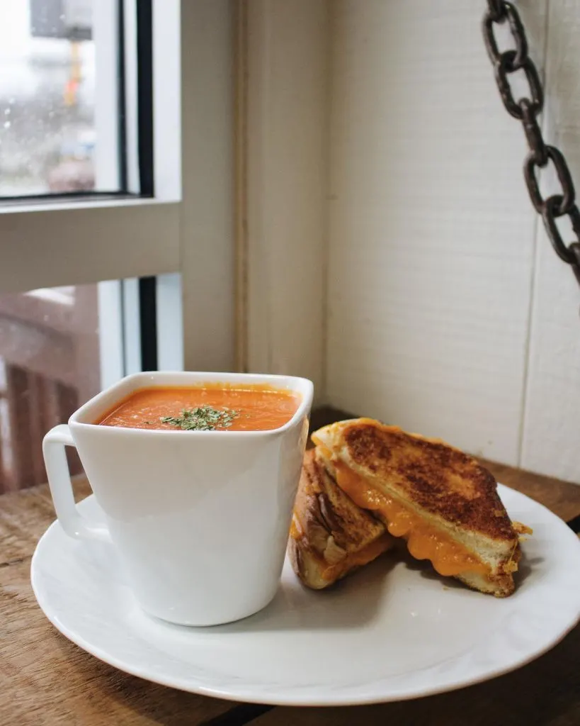 soup and grilled cheese on a plate