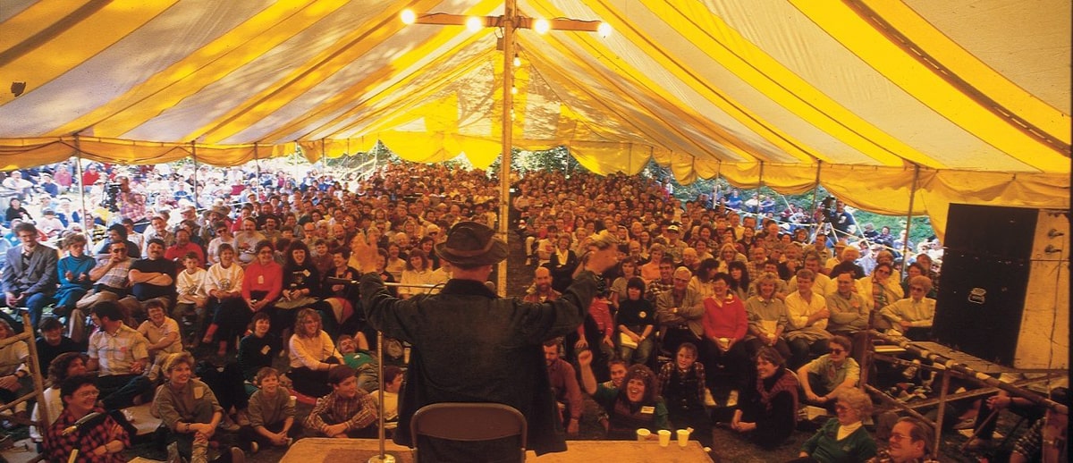 Storyteller under a tent in historic Jonesborough during the National Storytelling Festival