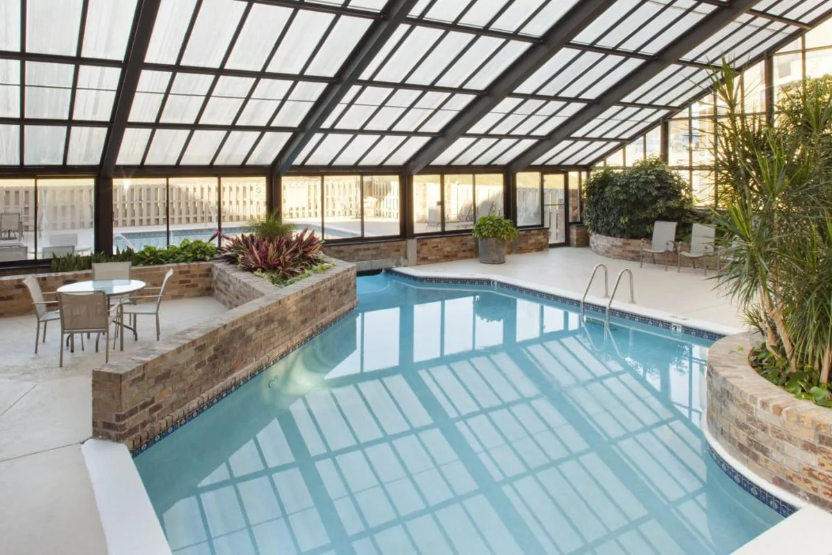 Indoor pool and outdoor seasonal pool in the background located at the double tree by hilton hotel 
