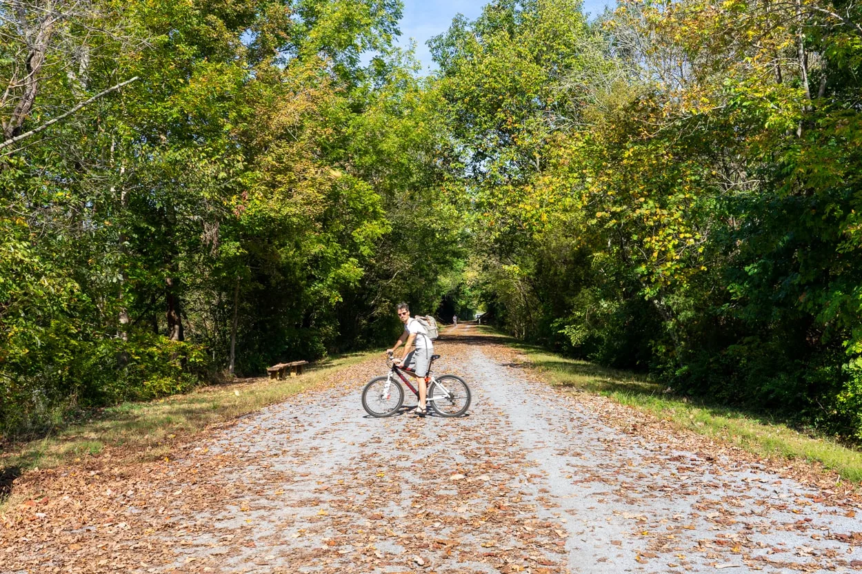 man riding a bike on the tweetsie trail in johnson city and tri-cities