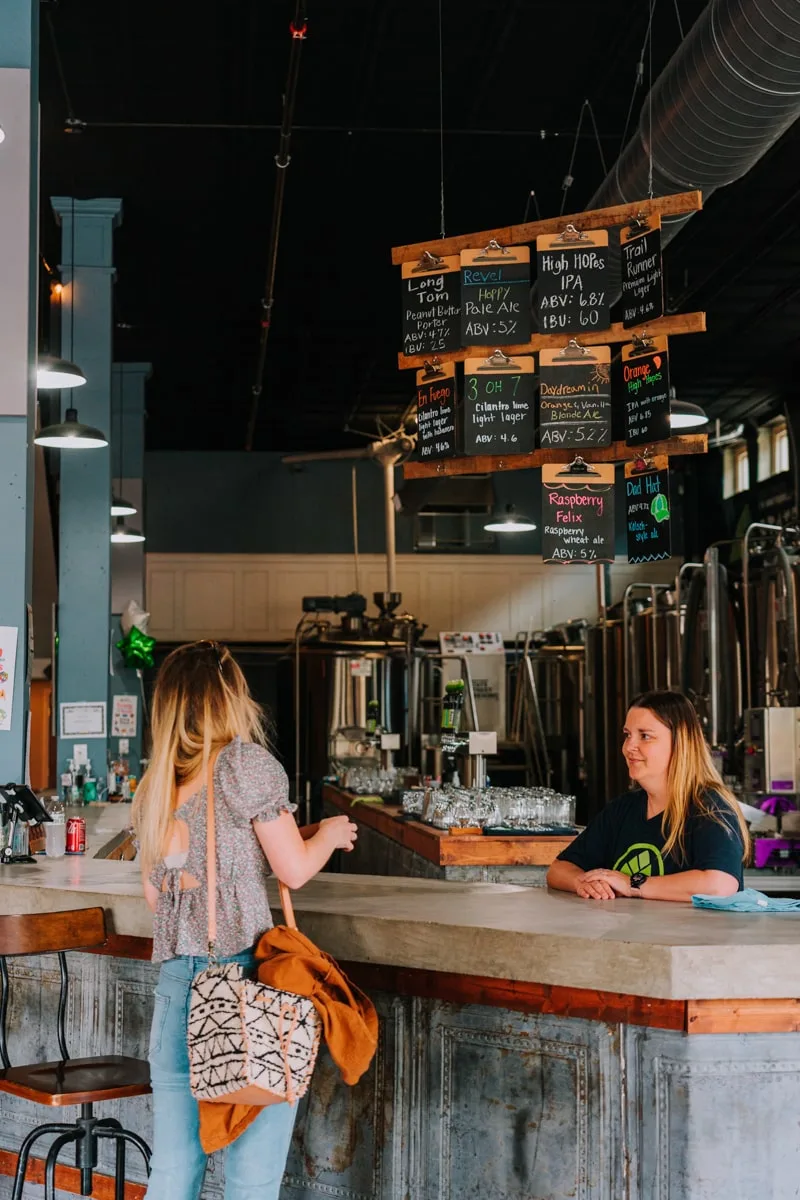 Woman ordering a craft beer at State Street Brewing in Bristol TN-VA.