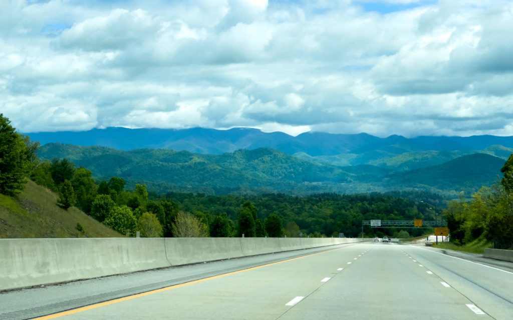 interstate between tn and nc with blue ridge mountains in the background