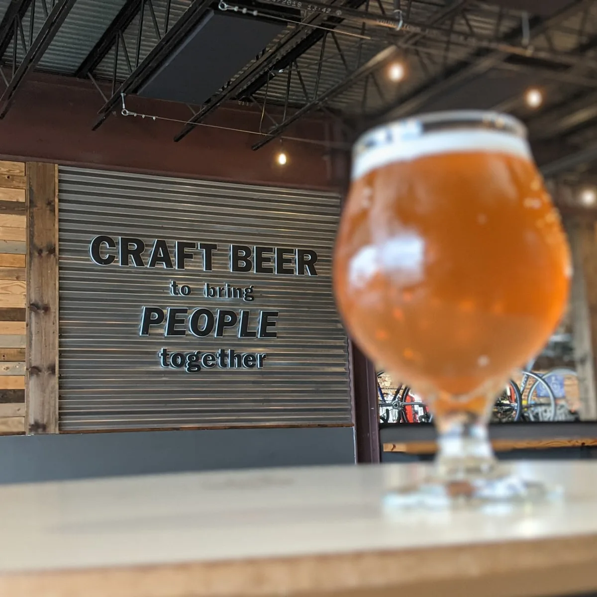 Sign showing "Craft Beer to bring People Together" at Bays Mountain Brewery 