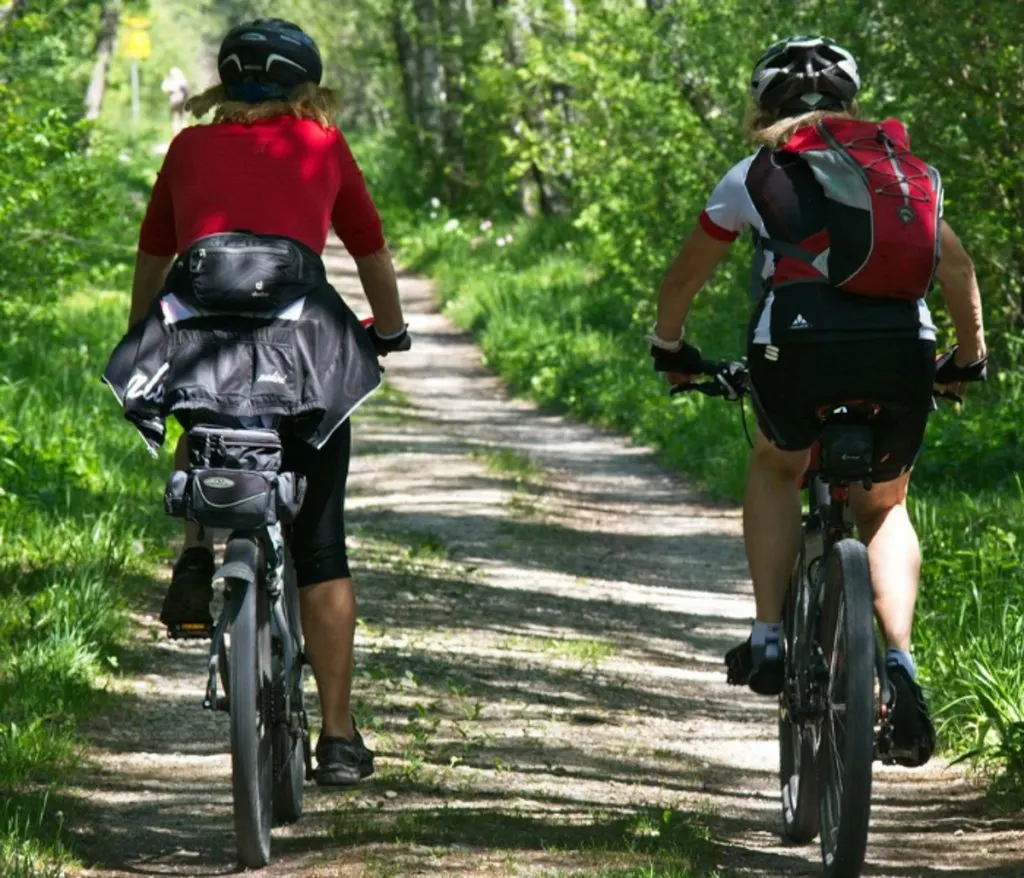 People riding bikes side by side at the Ijams Nature Center in Knoxville tN