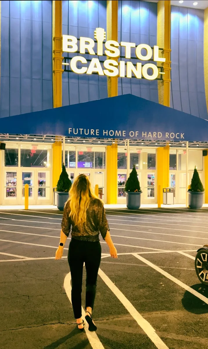 Woman walking into the Bristol Casino 