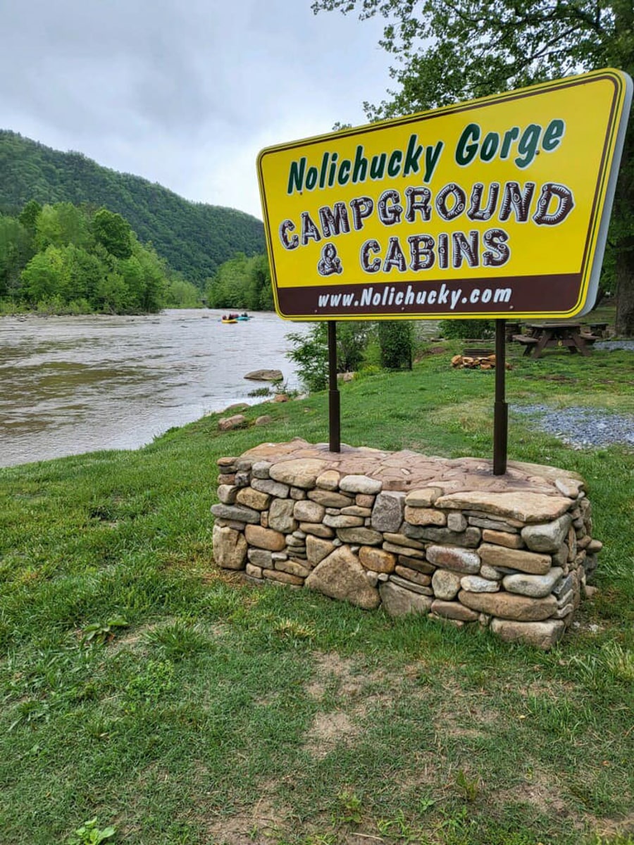 Nolichucky Gorge Campground sign along the  river 