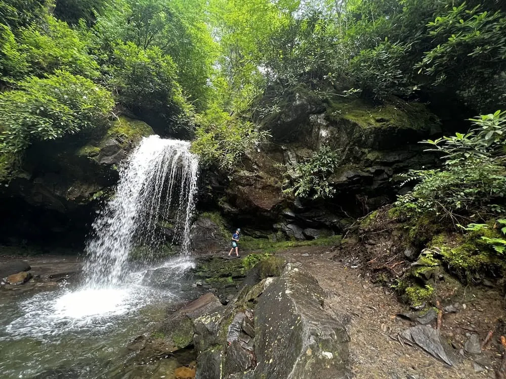 Grotto falls in the Smoky Mountains with trail to walk behind the falls 