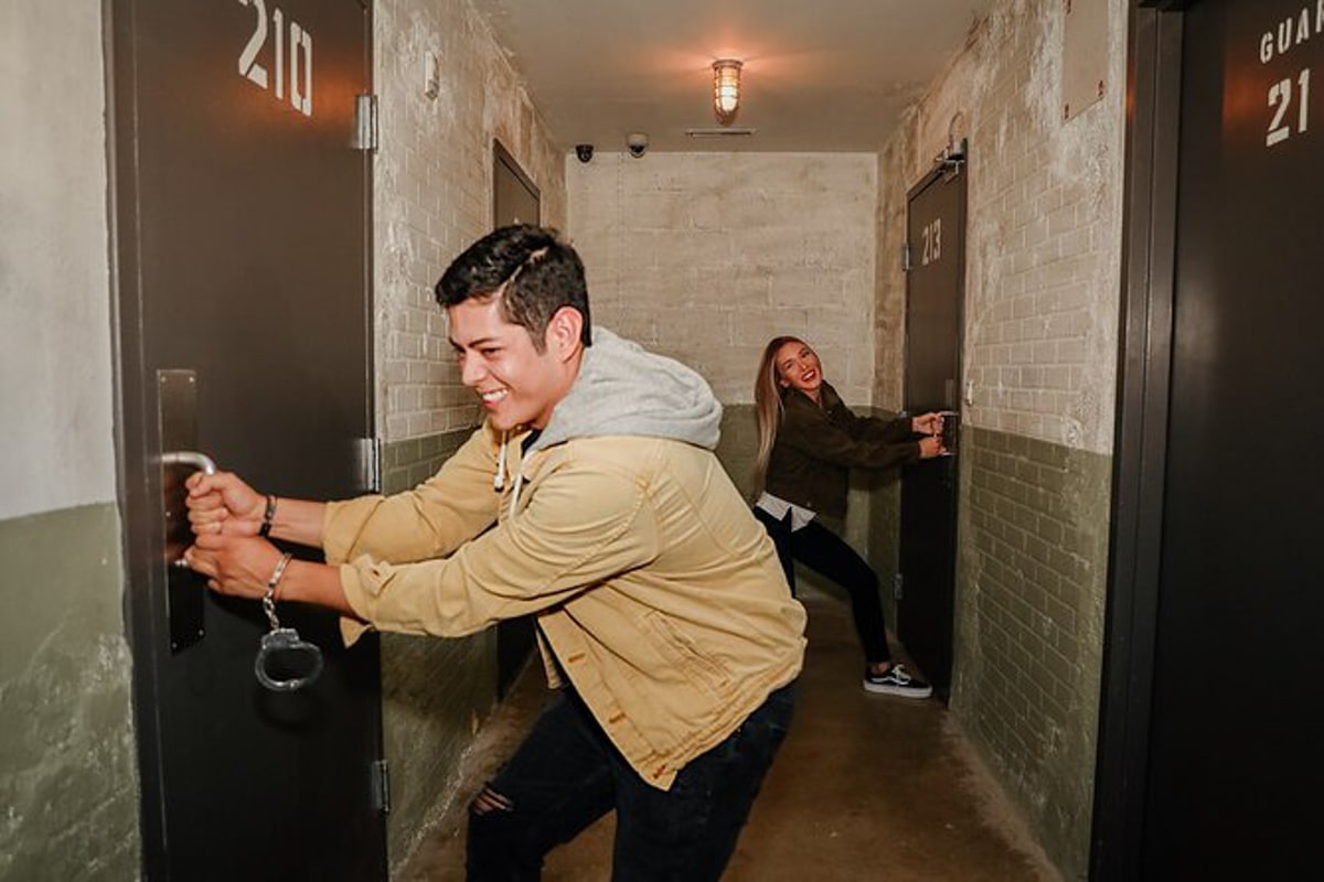 People trying to escape the C Block in Prison Escape Room