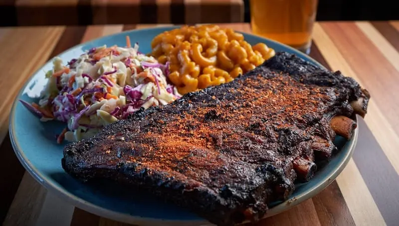 Rack of ribs and sides at Sweet P's restaurant in Knoxville TN for a Knoxville Food Tour