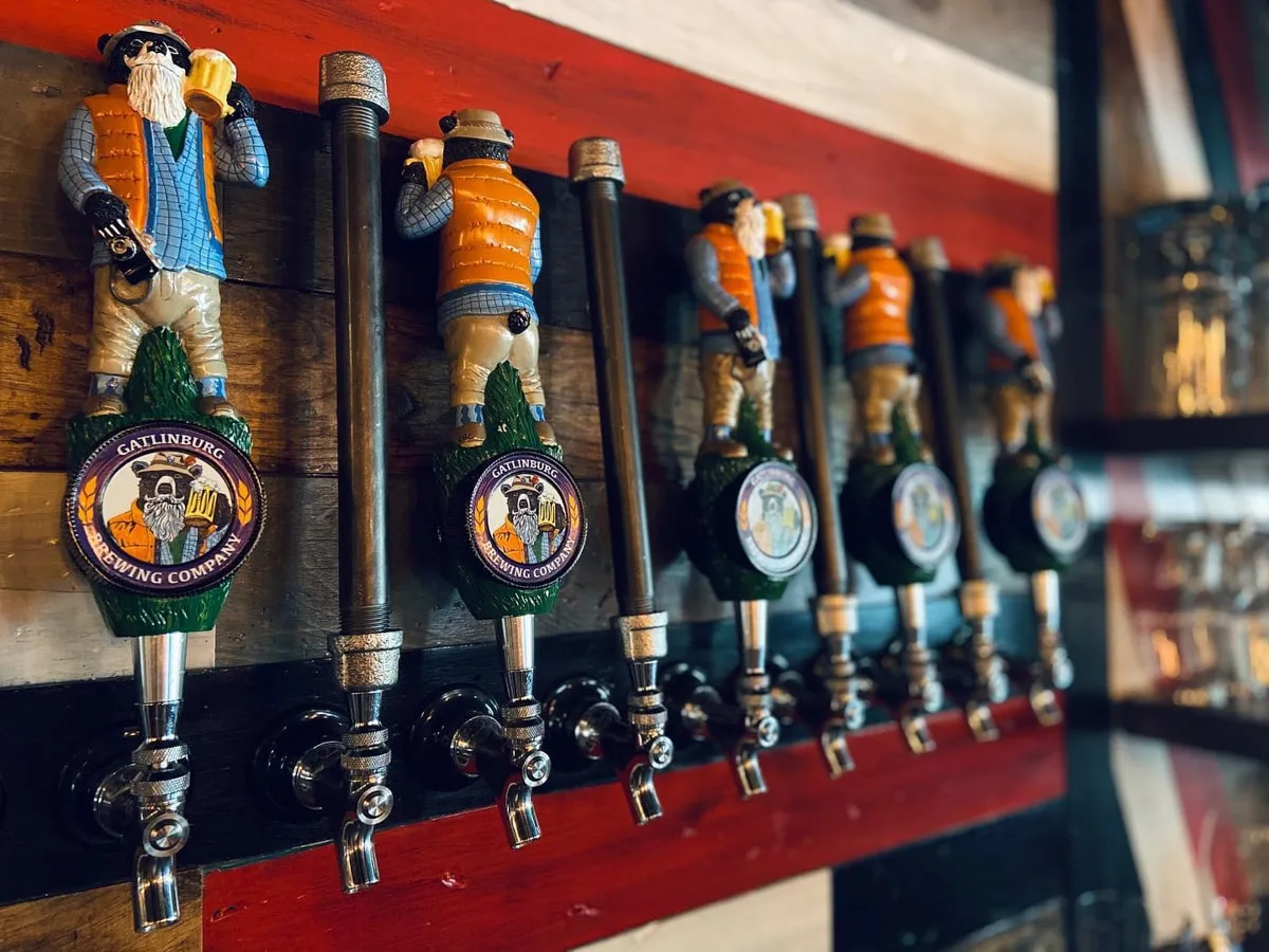 Draft Beer taps with Gatlinburg Brewing Company Mascot