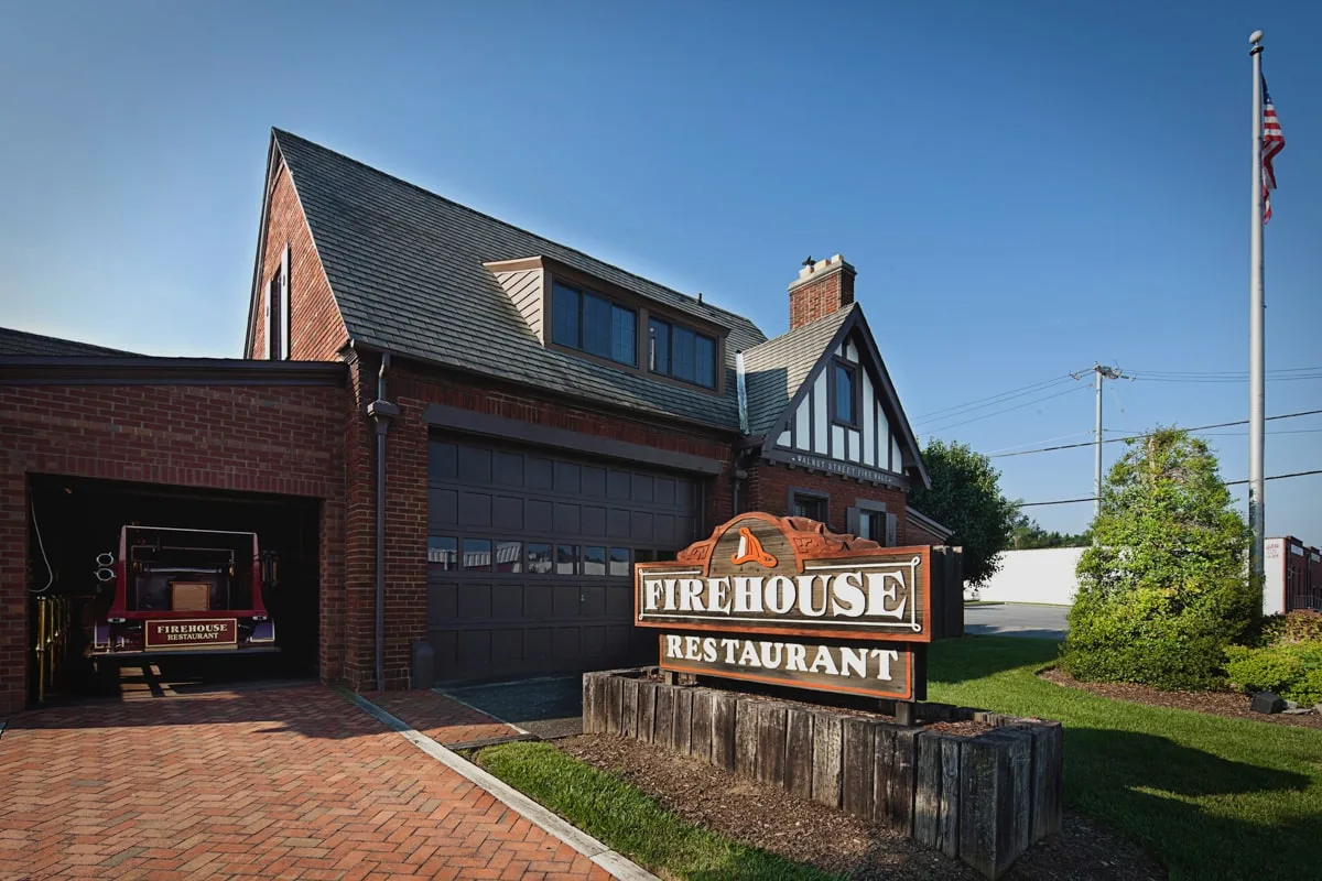 Exterior of the Firehouse restaurant with firetruck 