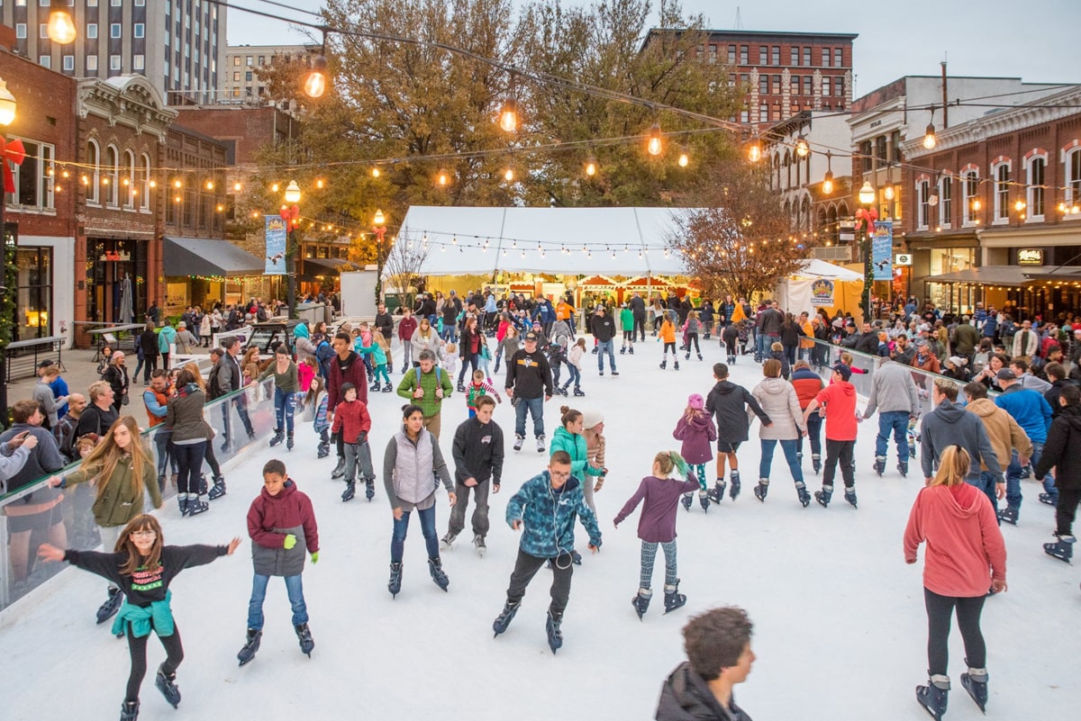 people ice skating in downtown knoxville Market Square for Christmas in Tennessee