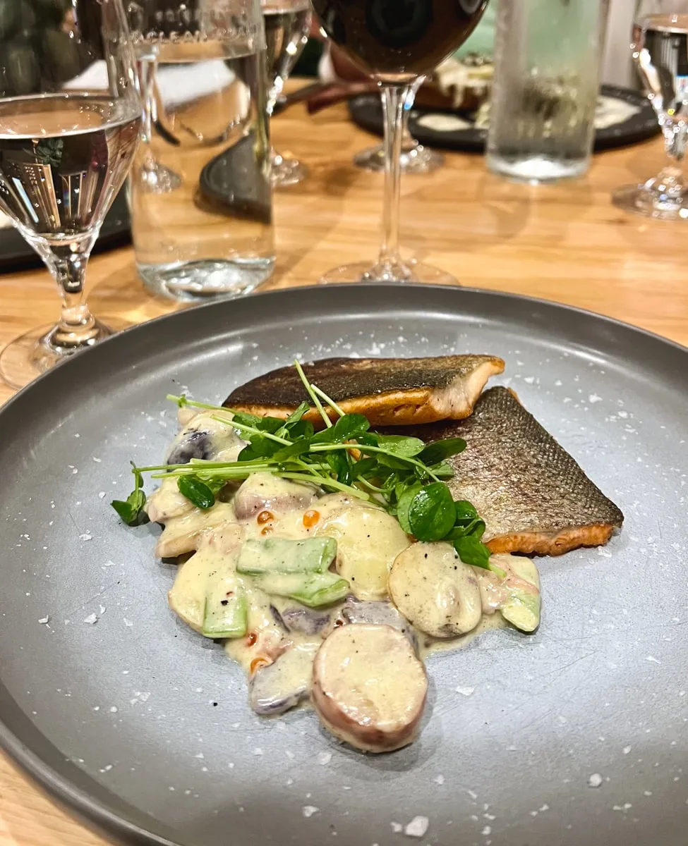 trout with creamed vegetables and fresh herbs