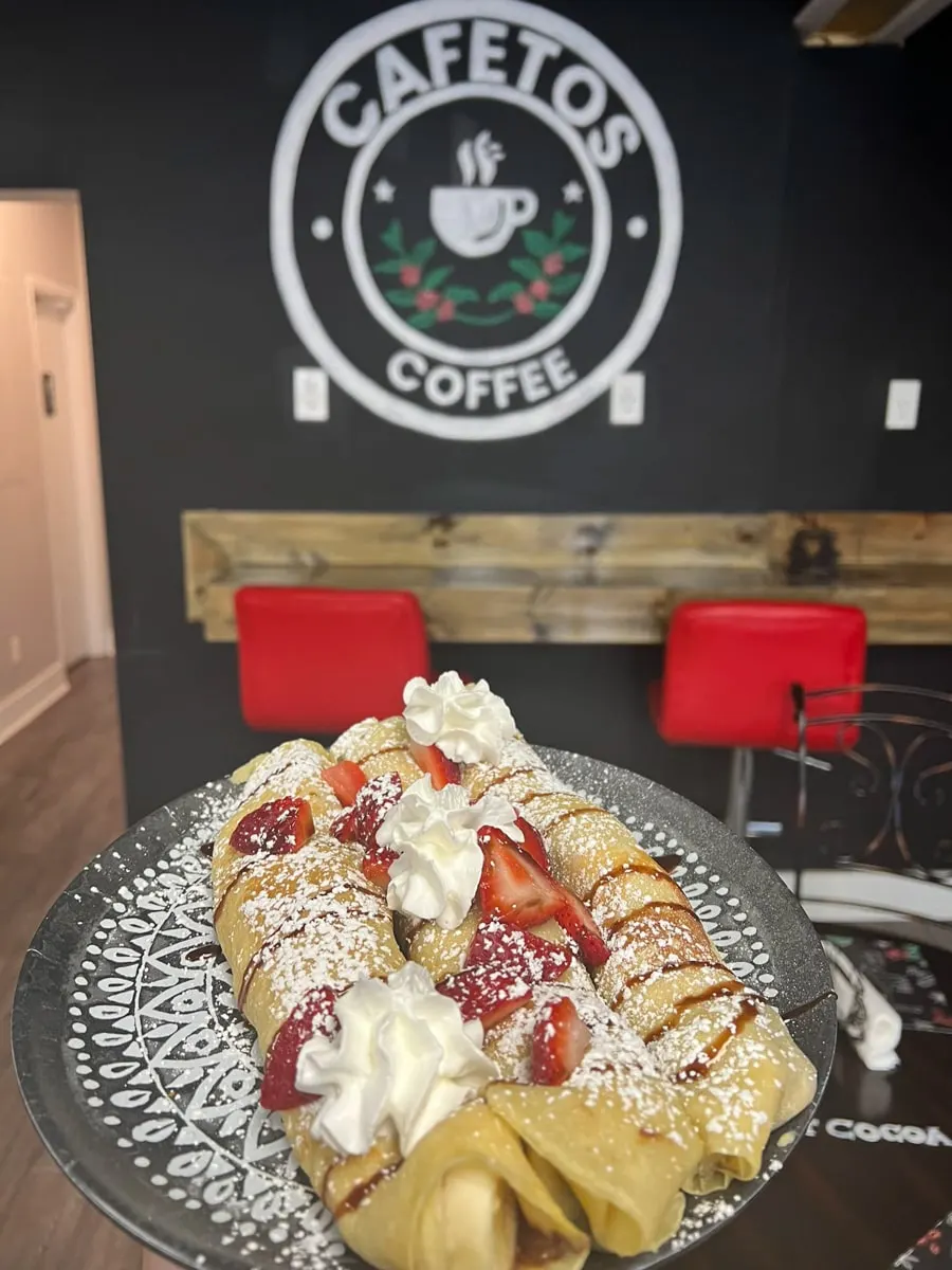 Crepes topped with whipped cream and strawberries in the Cafetos Coffee Shop in Johnson City, Tennessee
