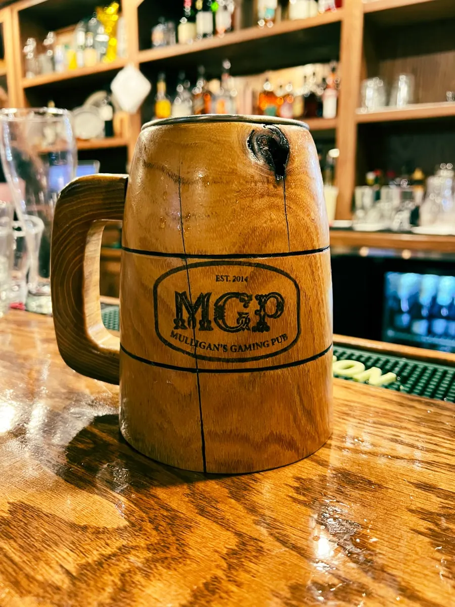 a pint of beer in a wooden mug at Mulligans Irish Pub in Johnson City