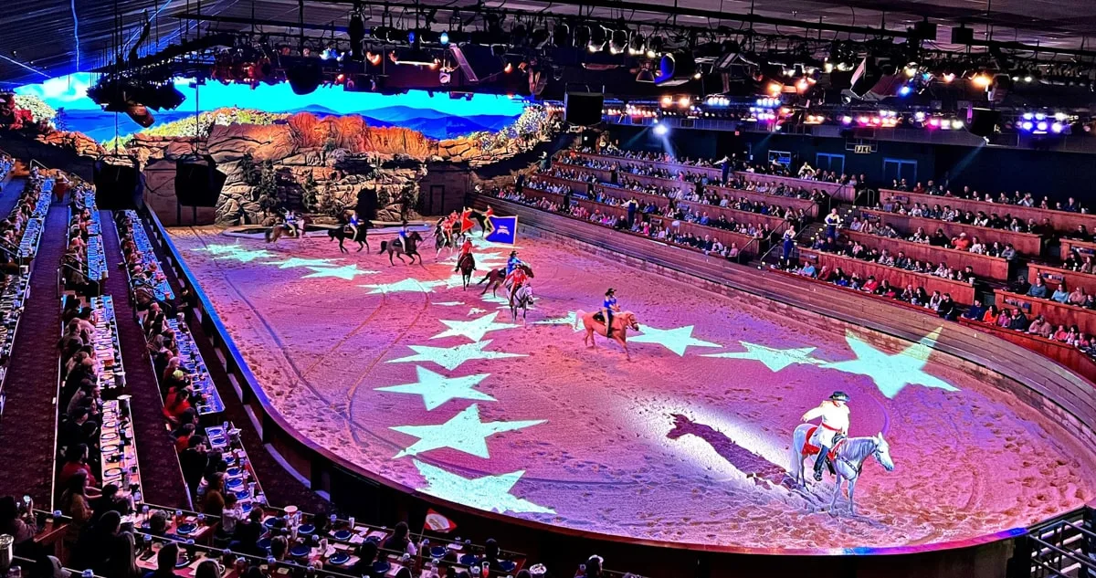 Dolly Parton's Stampede Dinner Show with horses and cowboys