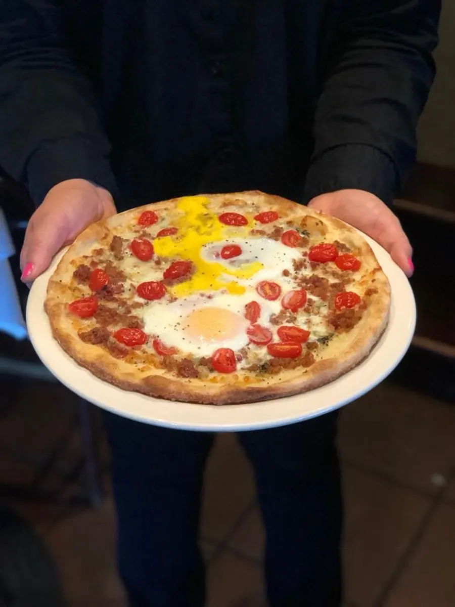 pizza topped with a fried egg at Giuseppes Restaurant in Kingsport TN 