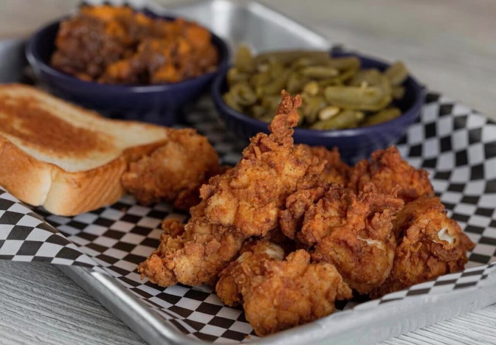 Fried chicken with a side of beans and toast at Nick's Restaurant in Kingsport TN