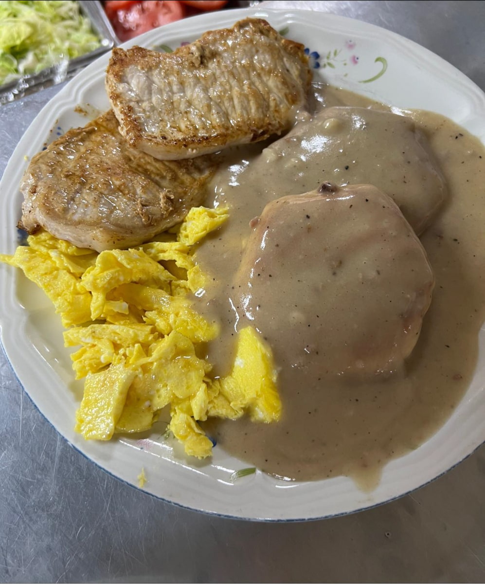 bicuits and gravy, eggs, and pork chops for breakfast at betty's stockyard cafe in kingsport tn 
