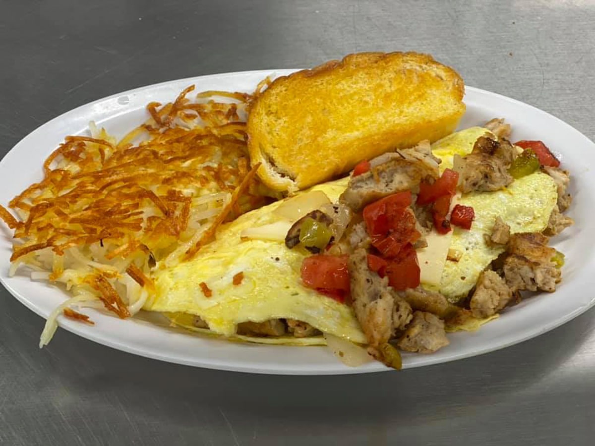 A chicken philly omelette with onions and peppers and hashbrowns at the old lighthouse diner in bristol tn 