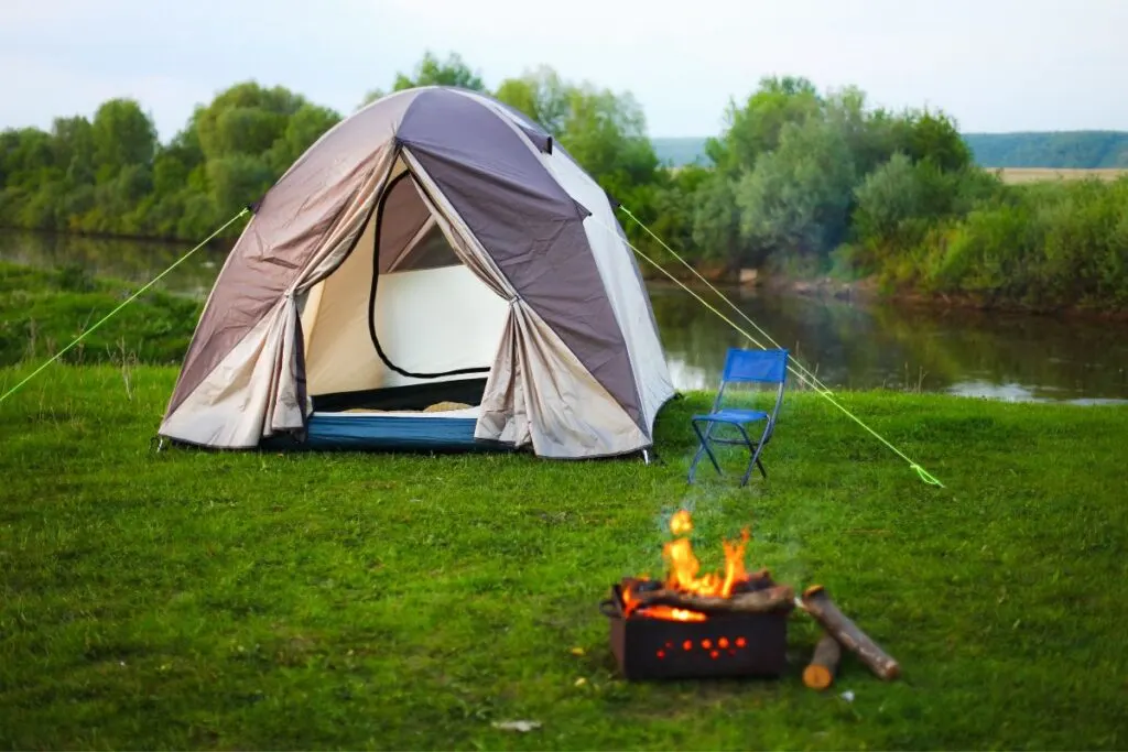 Riverside tent camping near Knoxville TN with outdoor fire pit.