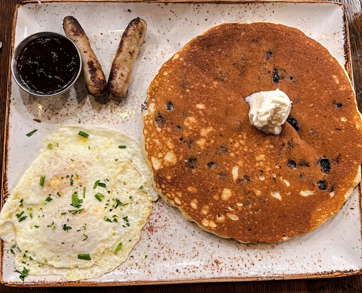 brunch with pancake, egg, and turkey sausage at First Watch Cafe in Johnson City TN