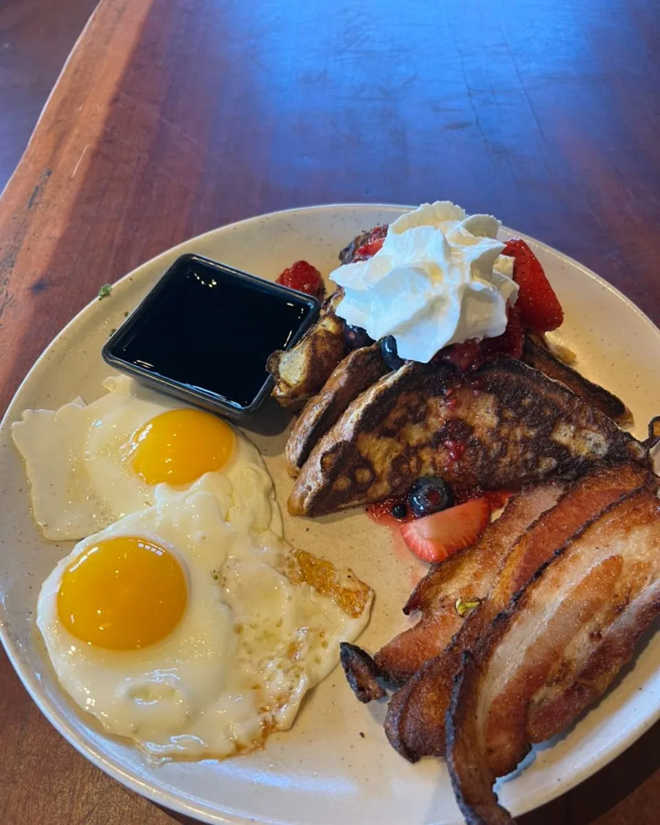 french toast, bacon, and sunny-side up eggs at Juan Siao brunch in Johnson City TN