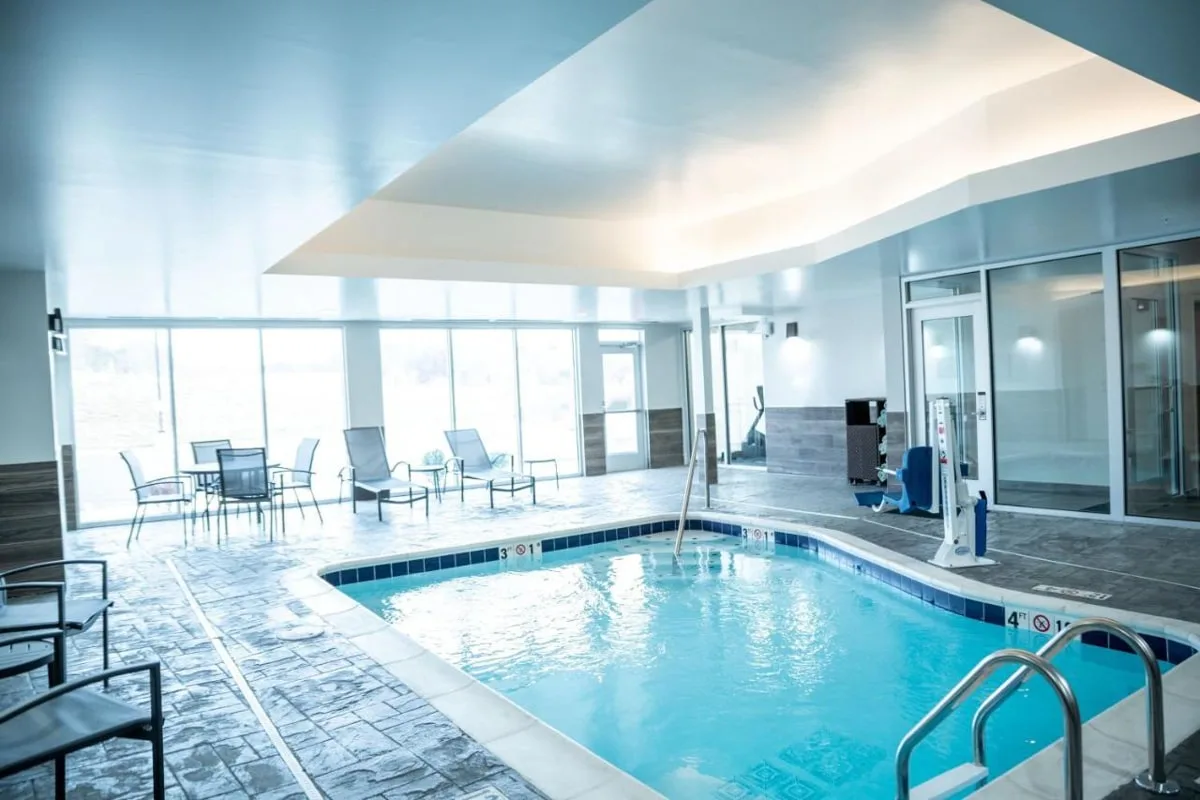 indoor pool with seating at fairfield inn and suites in kingsport tn 