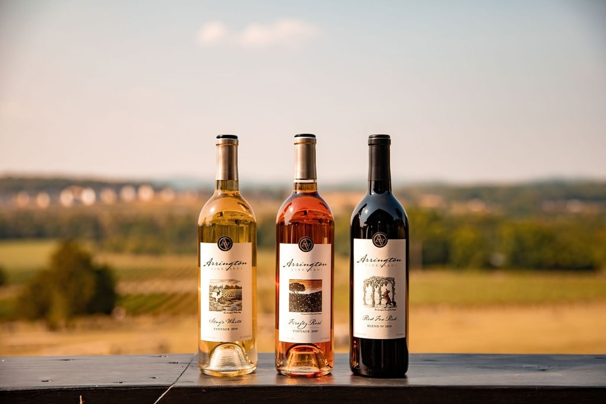 Wine bottles with vineyard in background at Arrington Vineyards near Franklin TN 