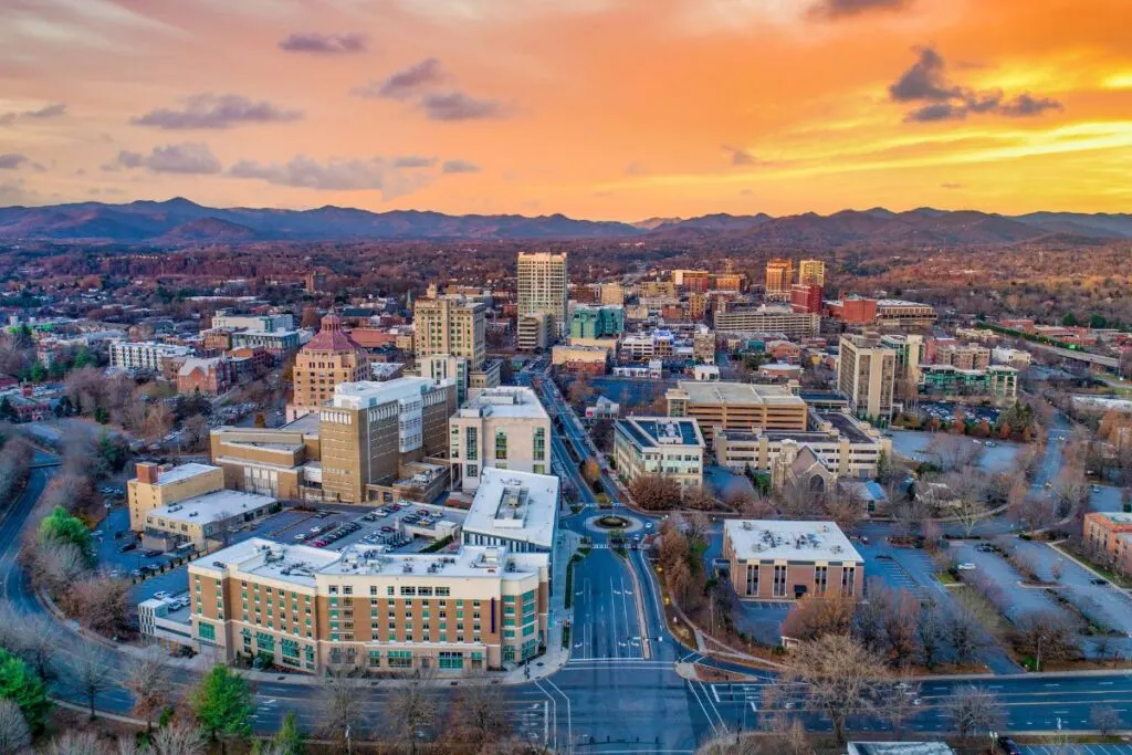 Skyline of downtown Asheville, North Carolina at sunset.