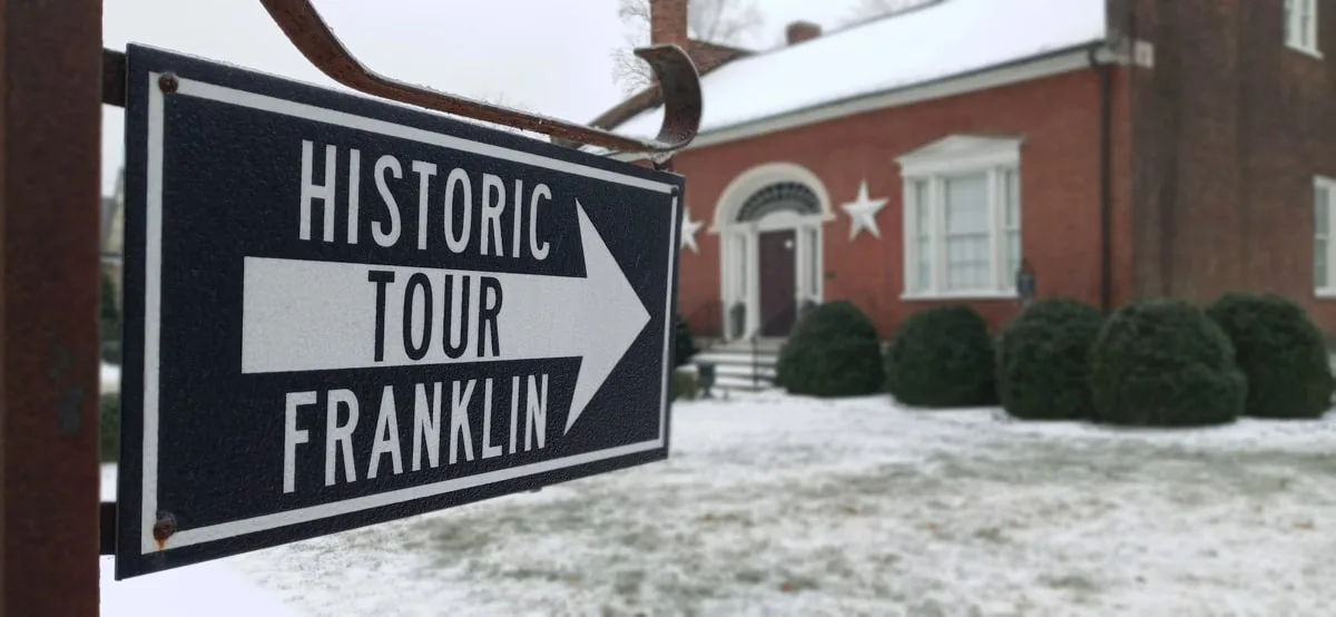 Historic Tour Franklin sign pointing from the Franklin on Foot tour group