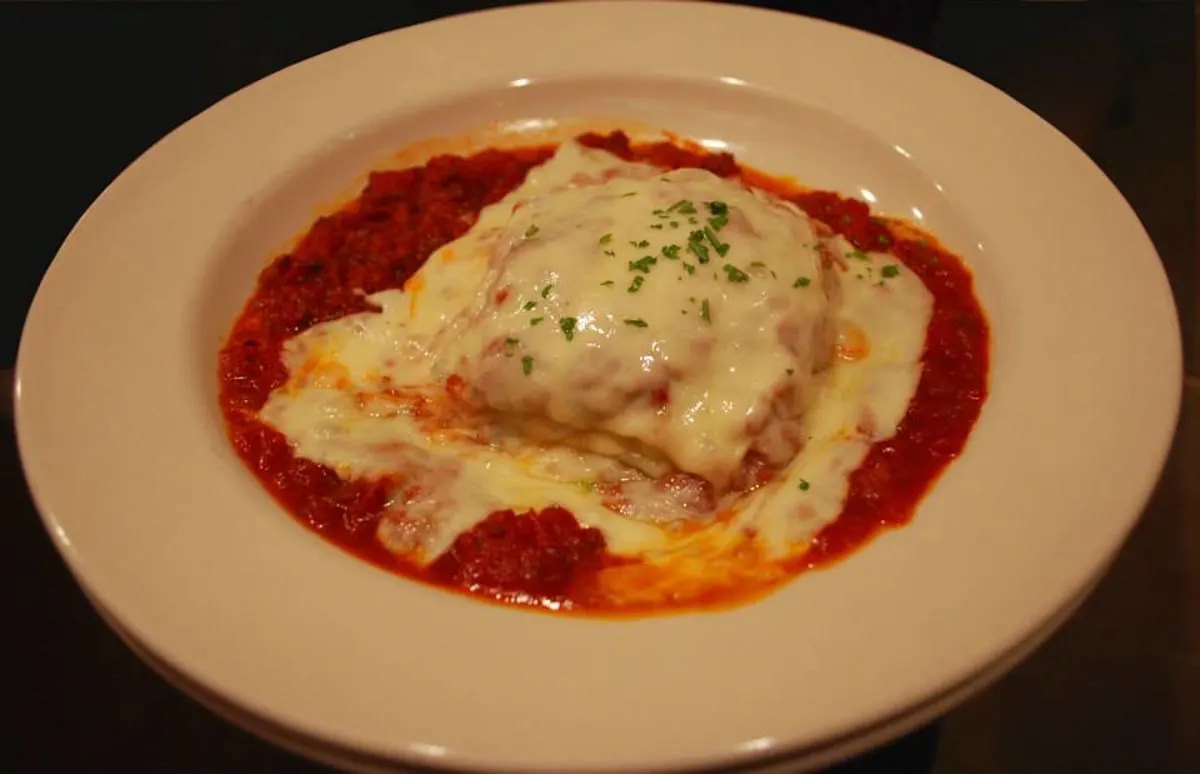 Lasagna topped with melted cheese and tomato sauce at black olive in jonesborough tn