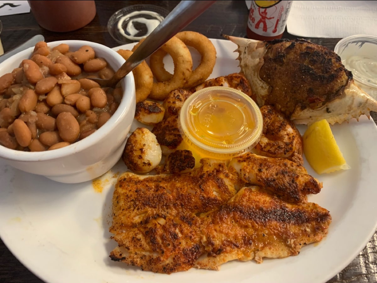 fish and seafood platter with onion rings and cowboy beans at mayflower seafood in elizabethton tn 