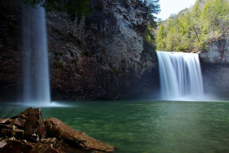 Cane Creek Falls waterfall tumbling into pool.