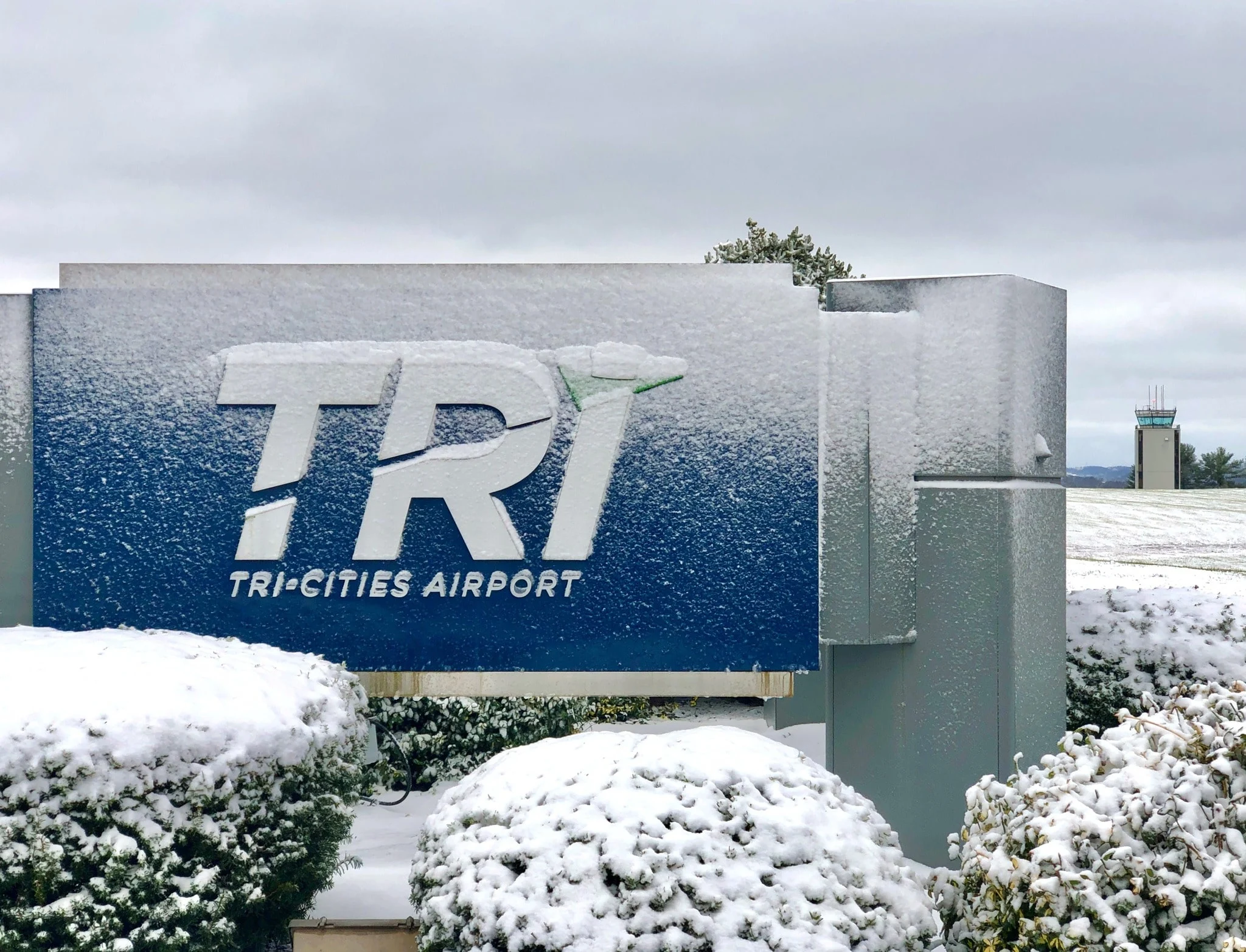 tri cities airport sign with snow