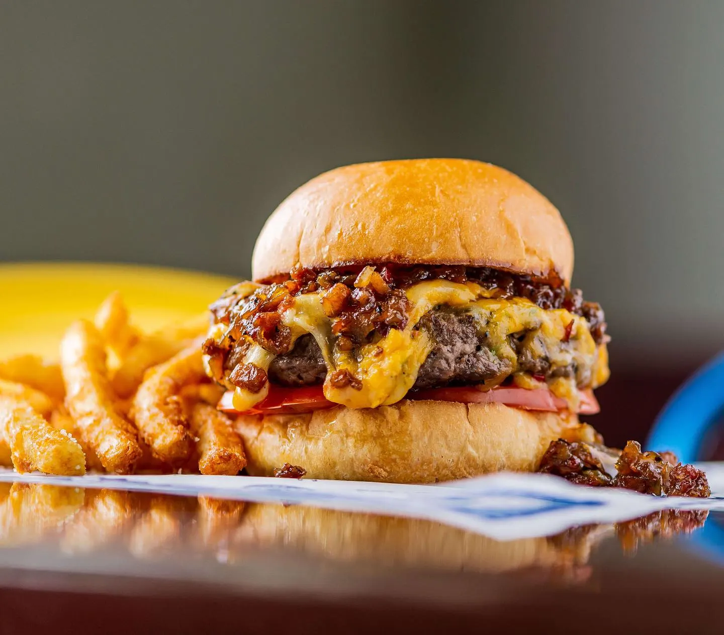 a loaded cheeseburger with fries at the hoss' loaded burgers food truck in nashville tn