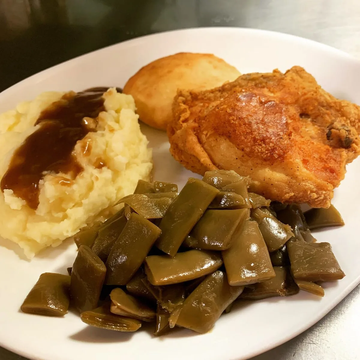 fried chicken with mashed potatoes and gravy and green beans at the maple grove restaurant in unicoi tn