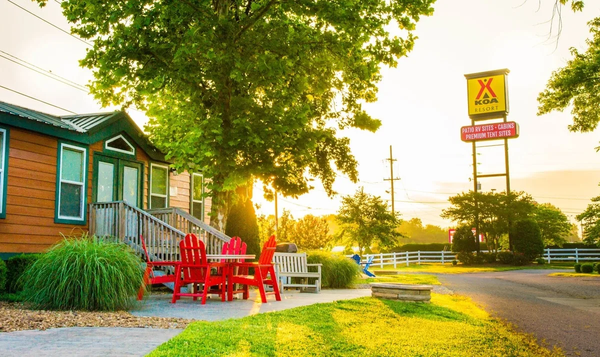 koa campground rv resort near nashville tn with log cabin and sign