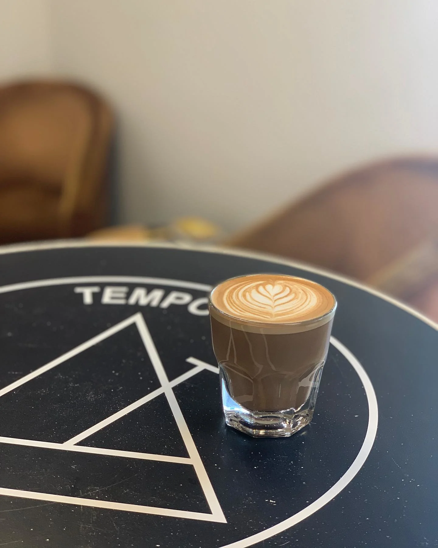a cold coffee with cute design perfect for sipping at tempo nashville tn 