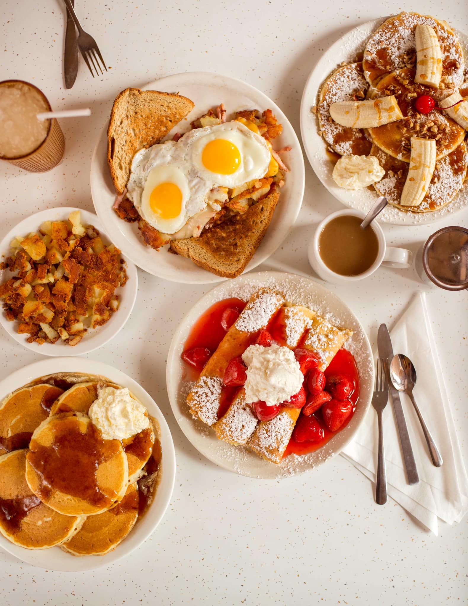an assortment of breakfast foods at the pancake pantry in nashville tn