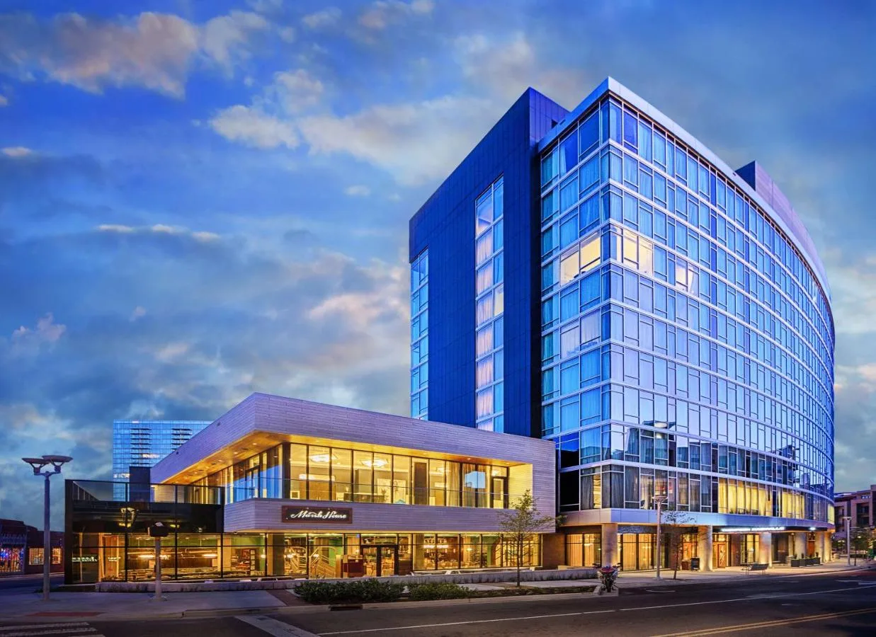 Building of the Thompson Nashville hotel with glass windows 