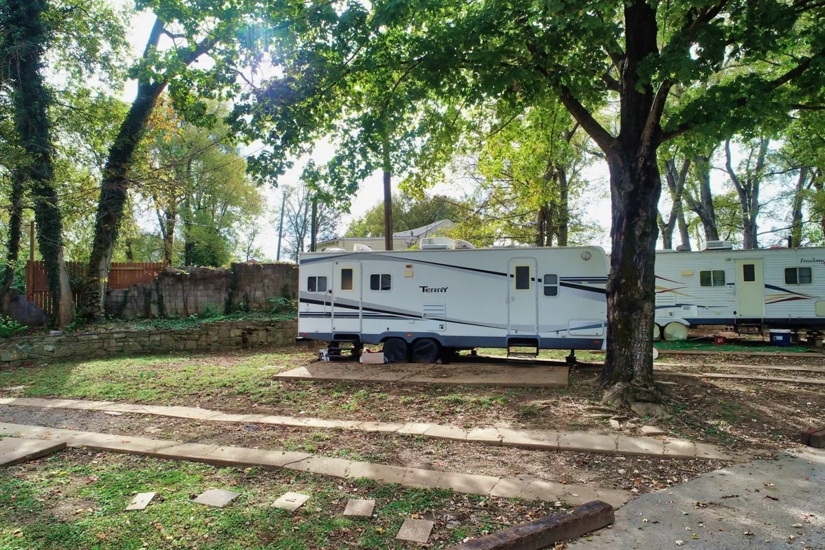 rv campers under shaded trees at trinity rv park in nashville tn 