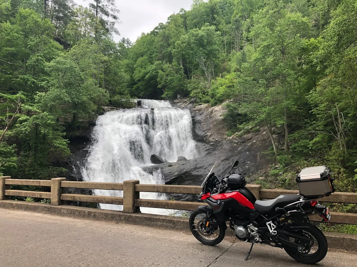 motorcylce on the road in tellico plains overlooking bald river falls