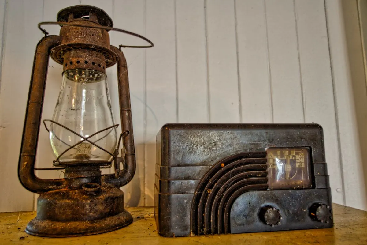 an antique lamp and radio