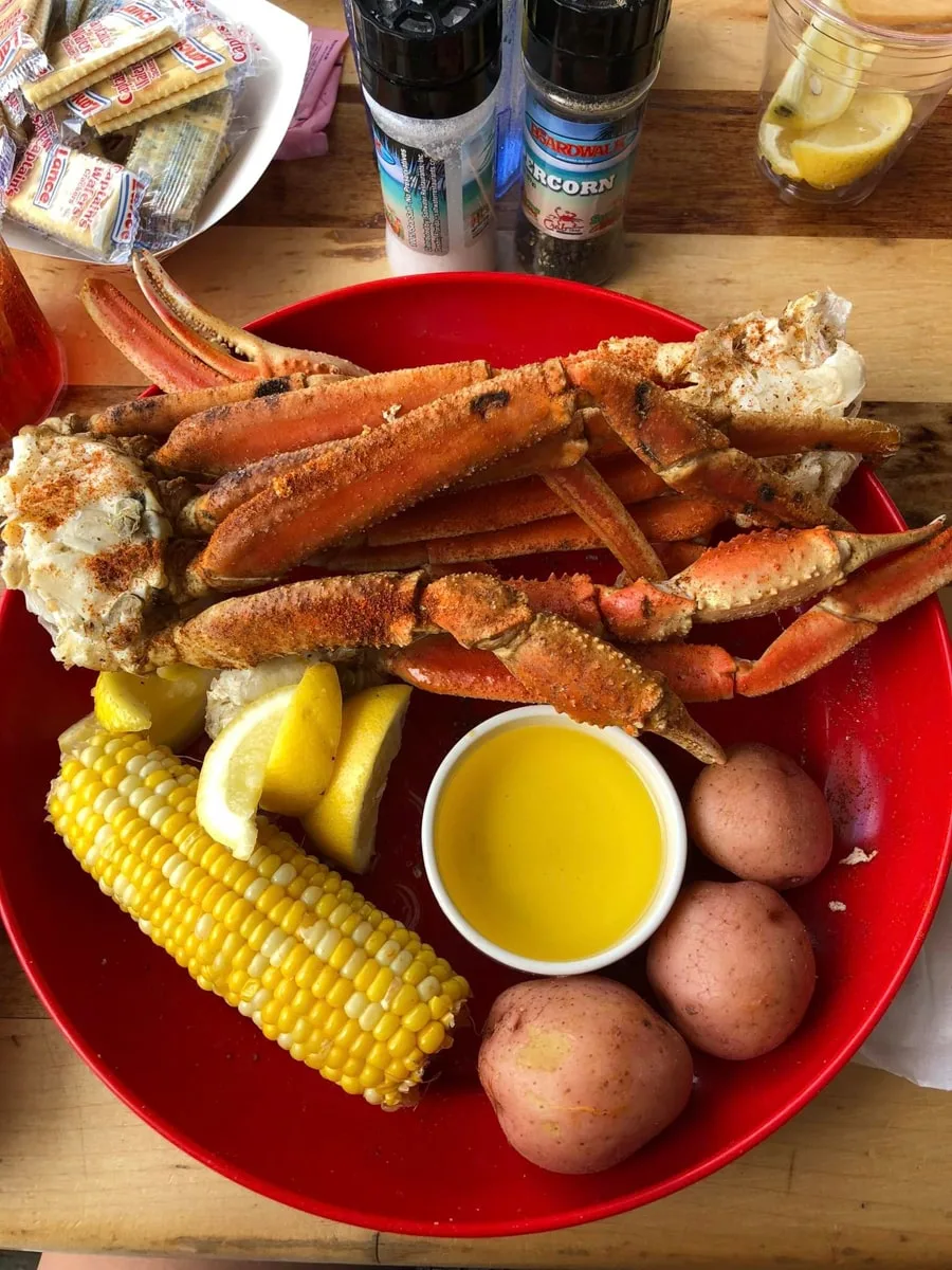 cajun style food with crab legs, red potatoes, and corn at bayou boys in johnson city tn 