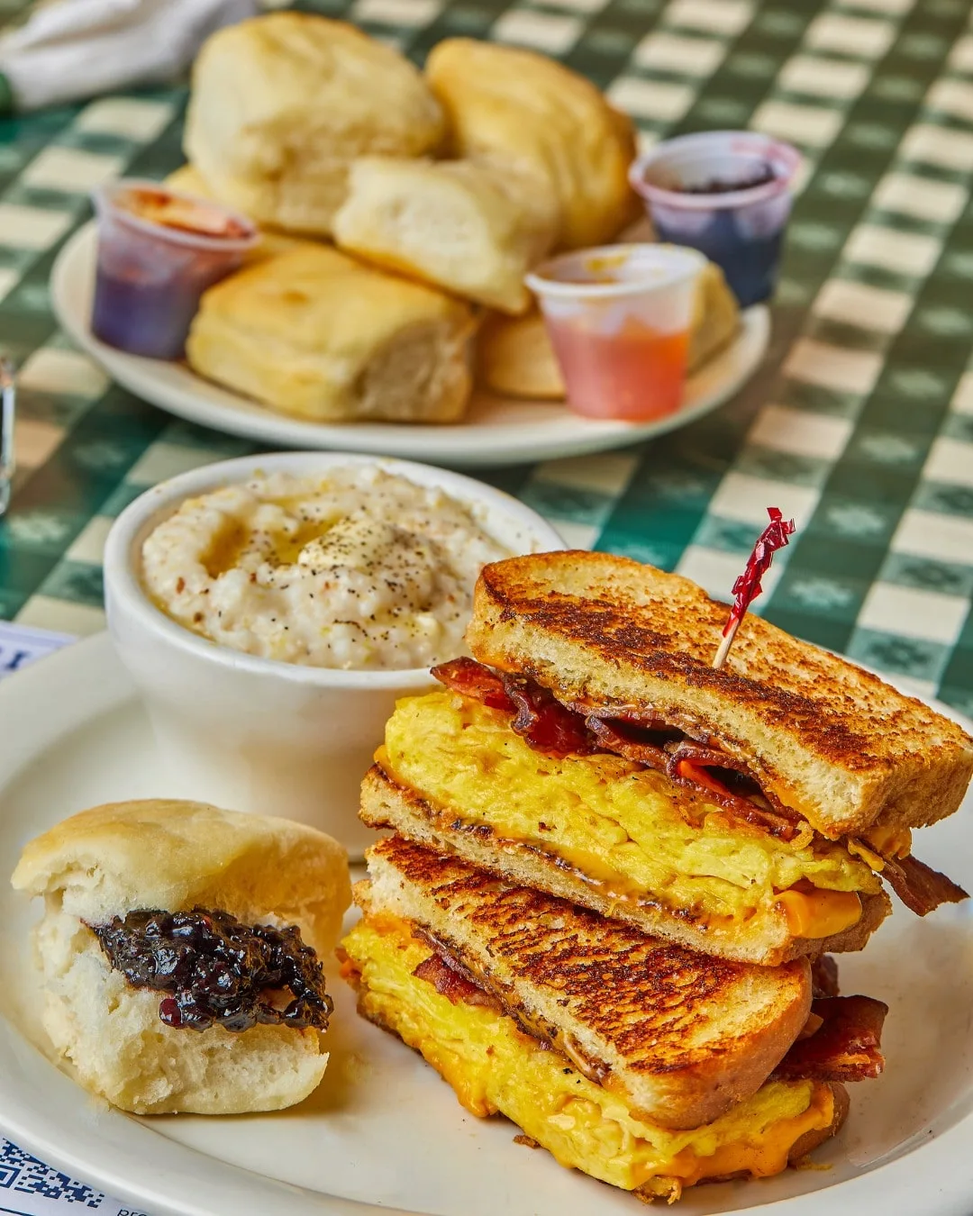 egg and bacon sandwich with biscuit and grits at loveless cafe nashville restaurant 