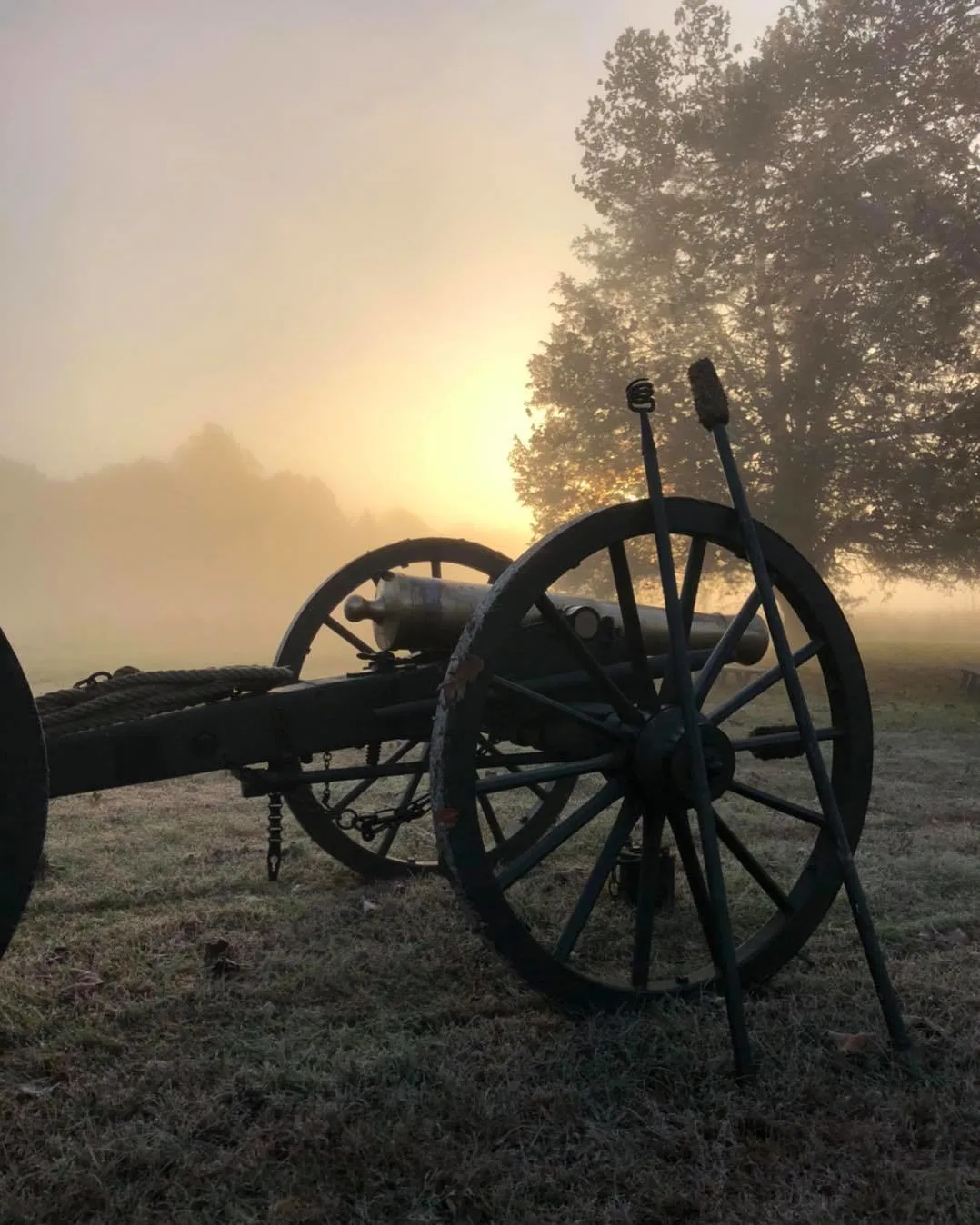 old cannon with foggy sunrise at stones river national battlefield in murfreesboro tn 