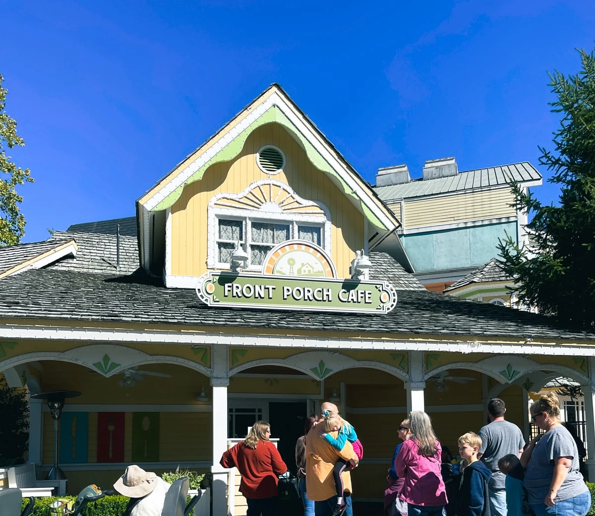 people waiting in line at front porch cafe in dollywood 