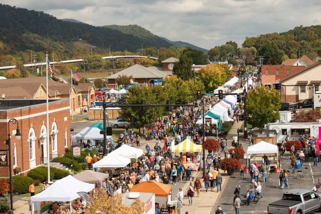 people and vendors lined up and down main street in erwin for the unicoi county apple festival 