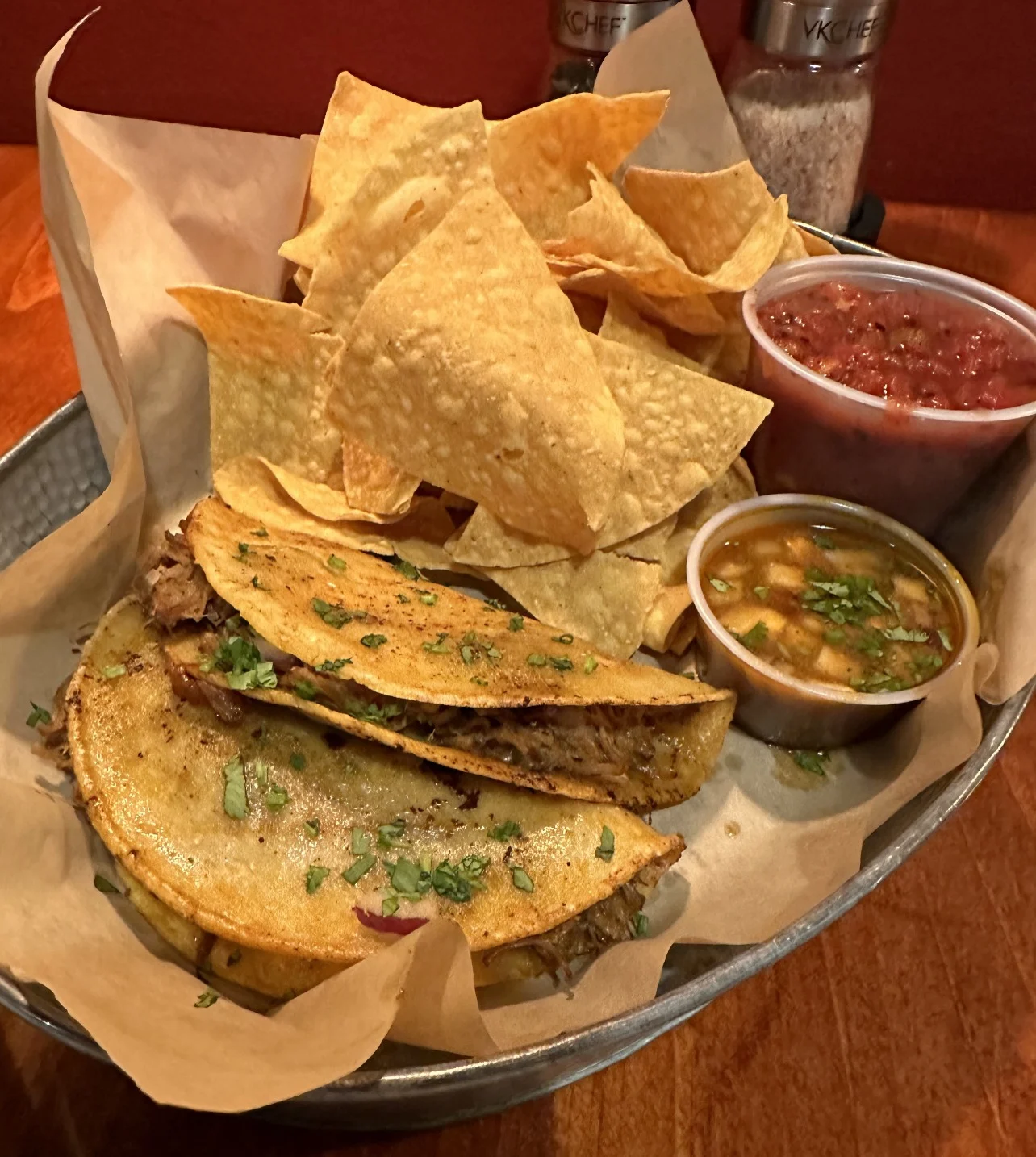 goat tacos in hard shells tacos with cilantro